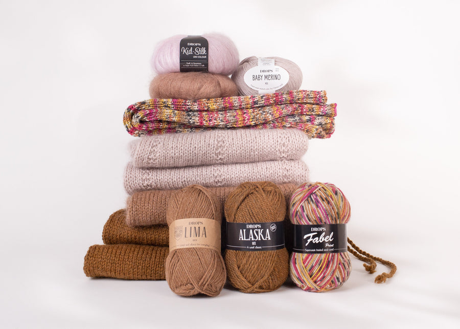 DROPS Fabel, Baby Merino och Lima med stickade plagg — garner som tål tvätt olika bra
